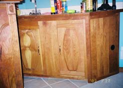 Storage cabinet with pocket door