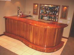 Cherry bar with curved slab top