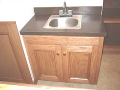 Sink cabinet & laminate top in back of bar