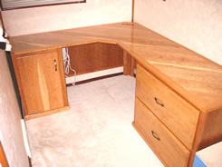 L-shaped cherry desk unit