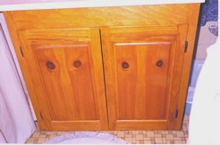 Pine vanity with book-matched door panels