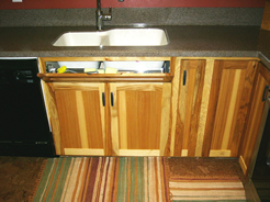 Sink tip-out drawer