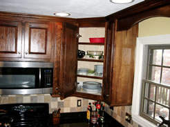 Corner cabinet with adjustable shelves