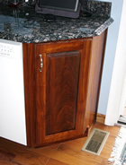 Angled end base cabinet