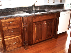 Walnut columns on sink front ....