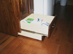 Deep bottom drawer built into toe-kick